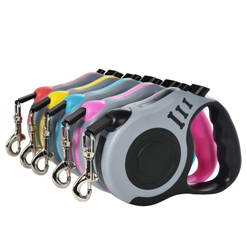 Soralab retractable dog leash in grey with pink, blue, yellow, and red accents. Features anti-slip handle and lock.
